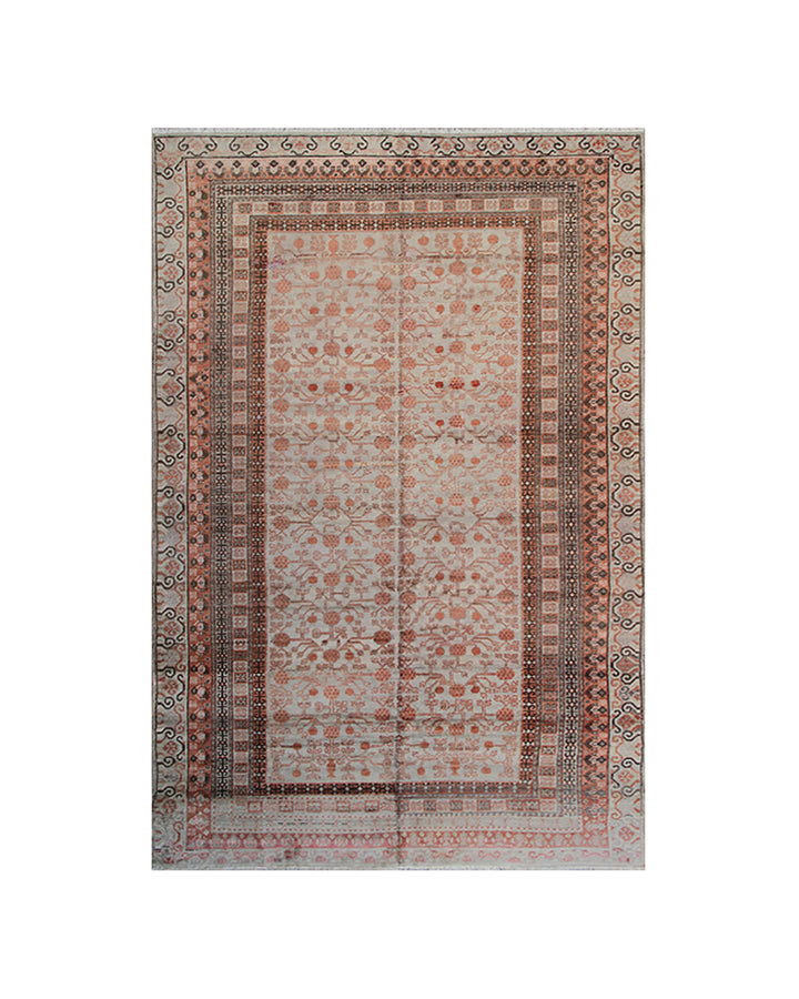 Decorative rug with intricate patterns on a white background