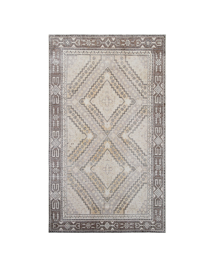 Decorative rug with geometric pattern on a white background