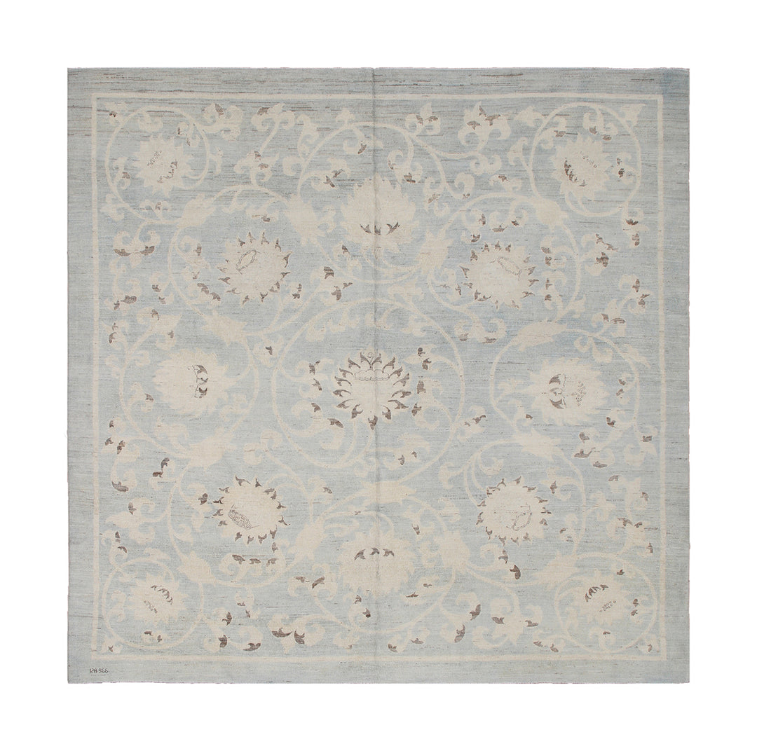 Decorative rug with floral pattern on a light blue background