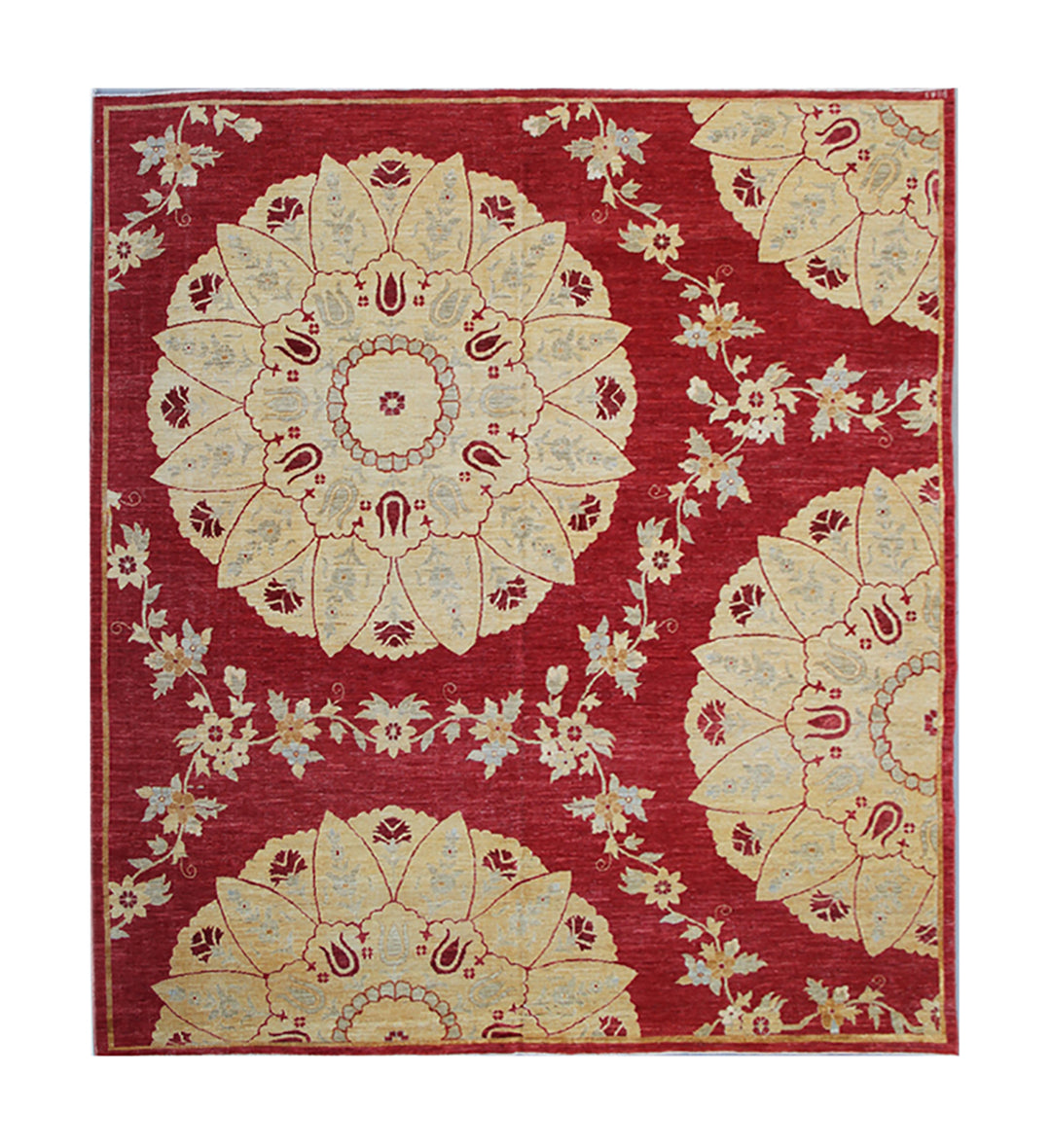 Red and beige floral patterned rug