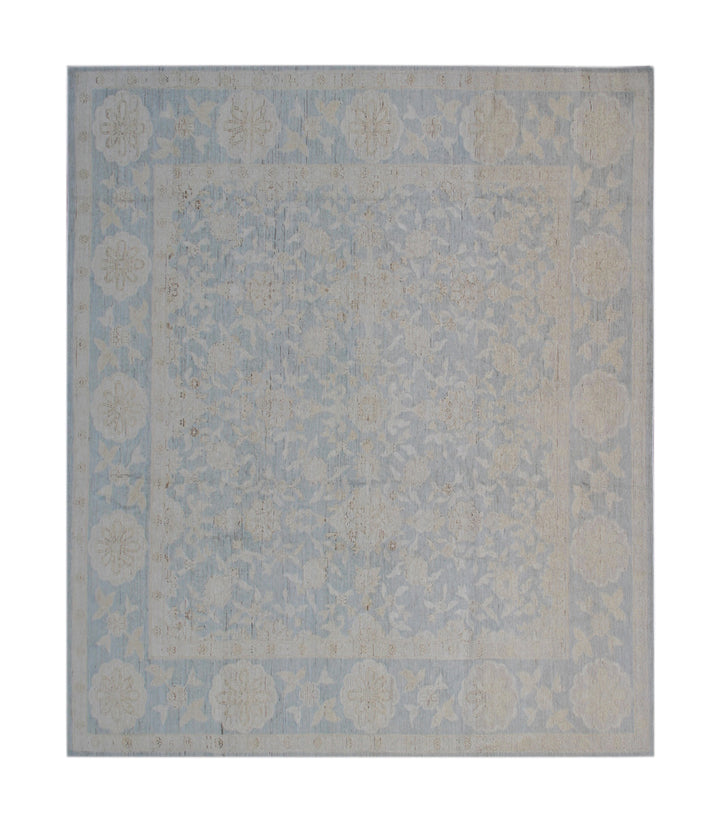 Decorative rug with a floral pattern on a plain background