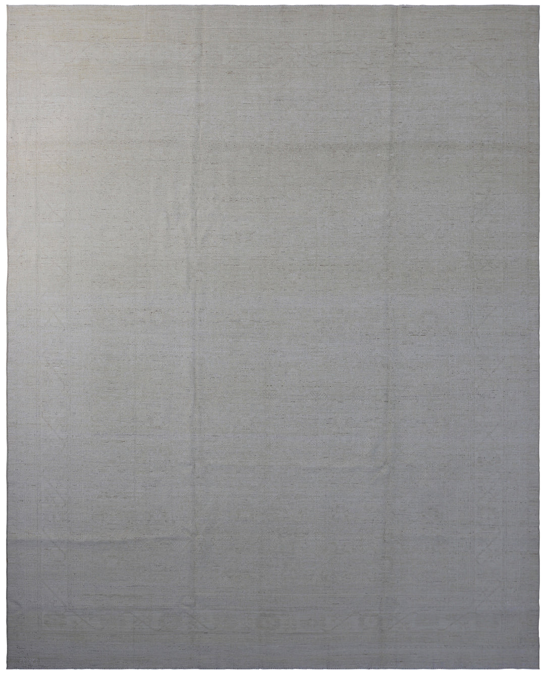 A wool on cotton rug with a geometric design in an ivory color, dimensions 8'10" x 11'7".