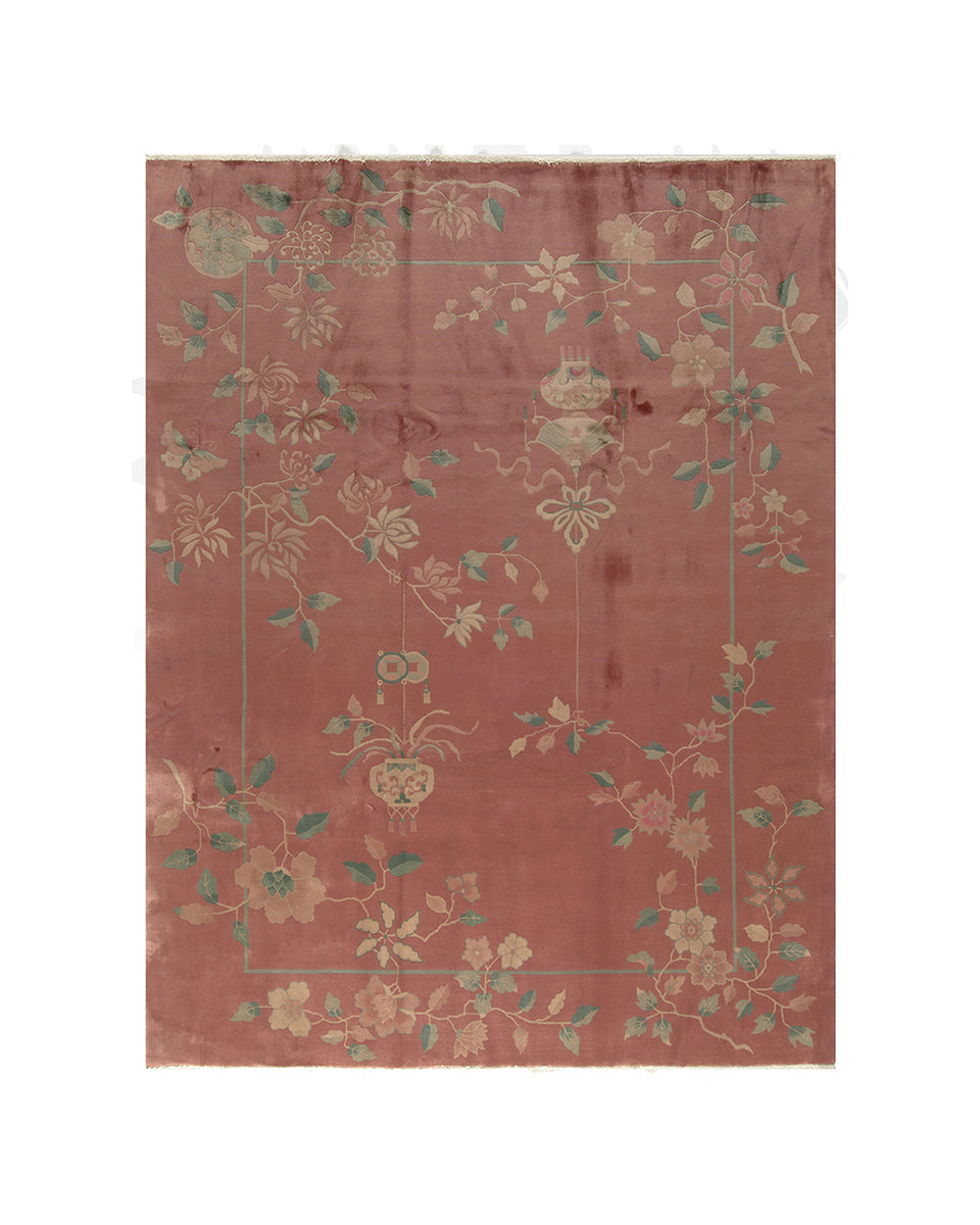 Decorative rug with floral patterns on a plain background