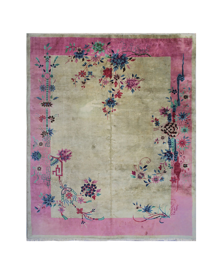 Decorative rug with floral patterns on a pink border