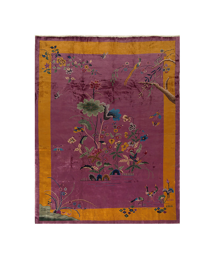Decorative rug with floral and bird patterns on a purple background