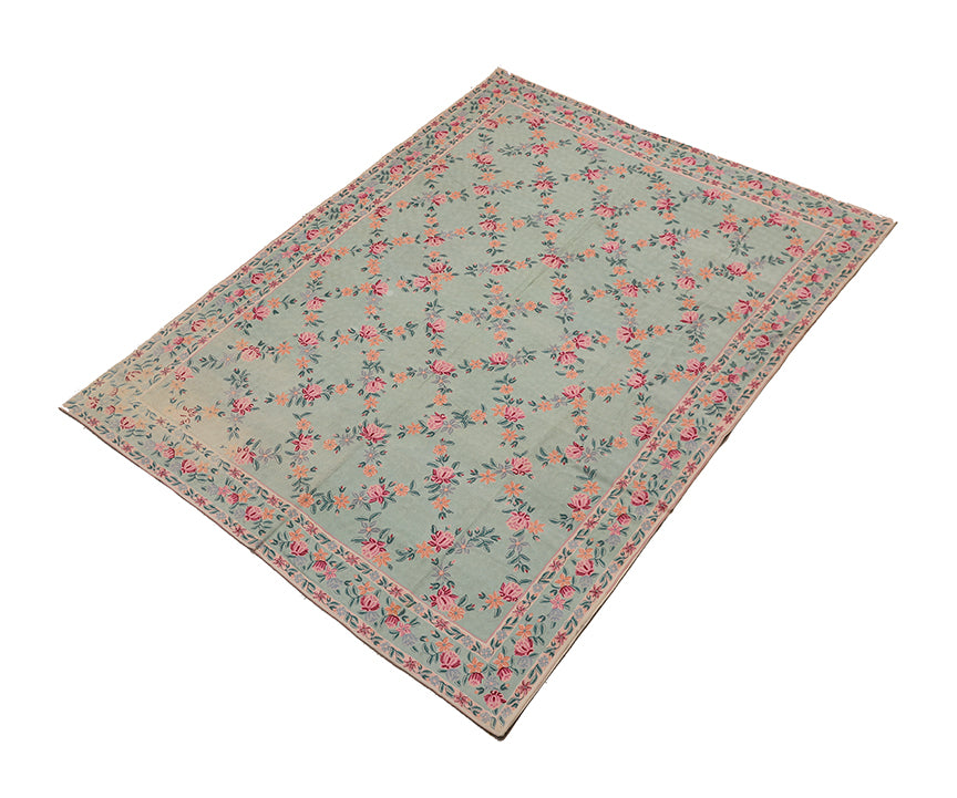 Floral patterned rug on a white background