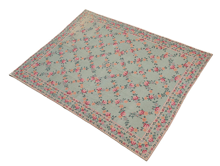 Floral patterned rug on a white background