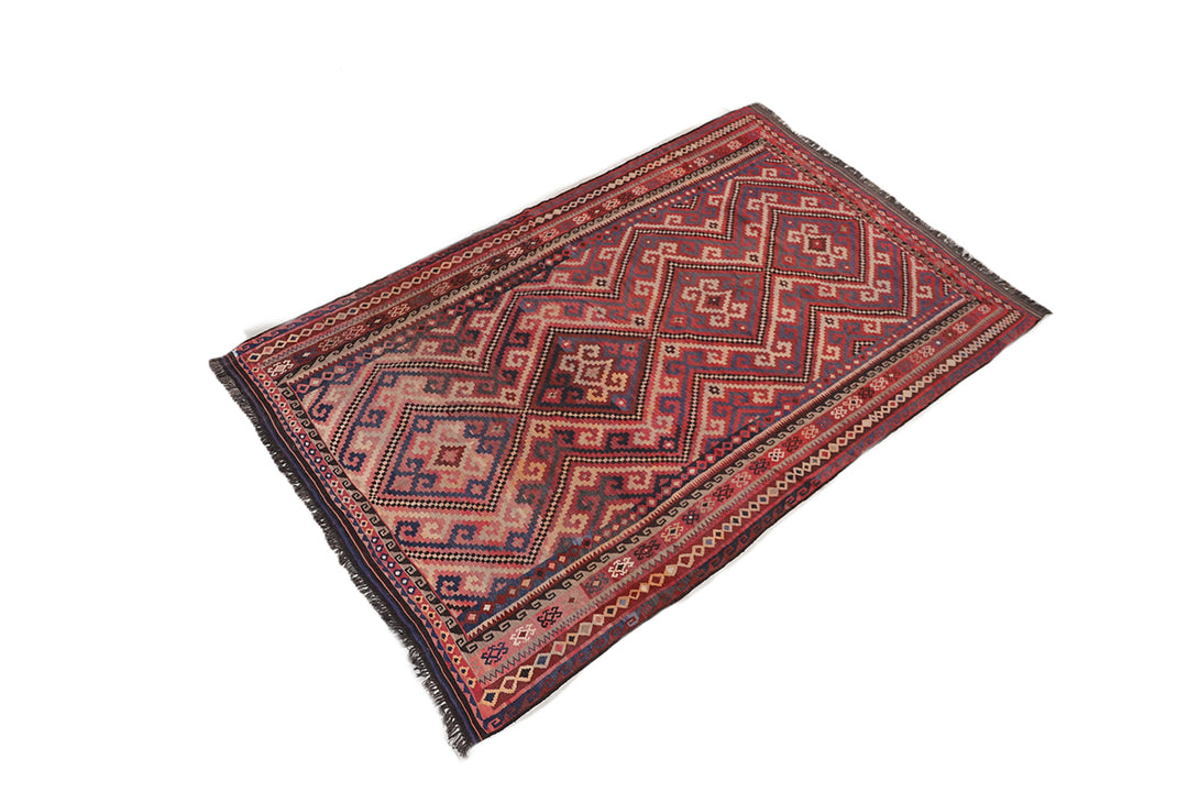 Decorative rug with intricate patterns on a white background