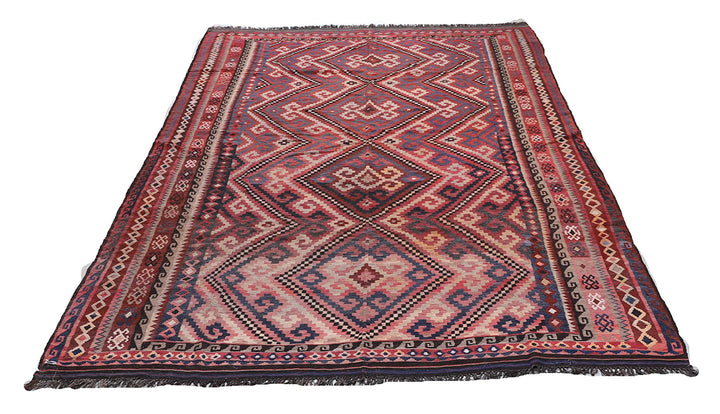 Decorative rug with geometric pattern on a white background