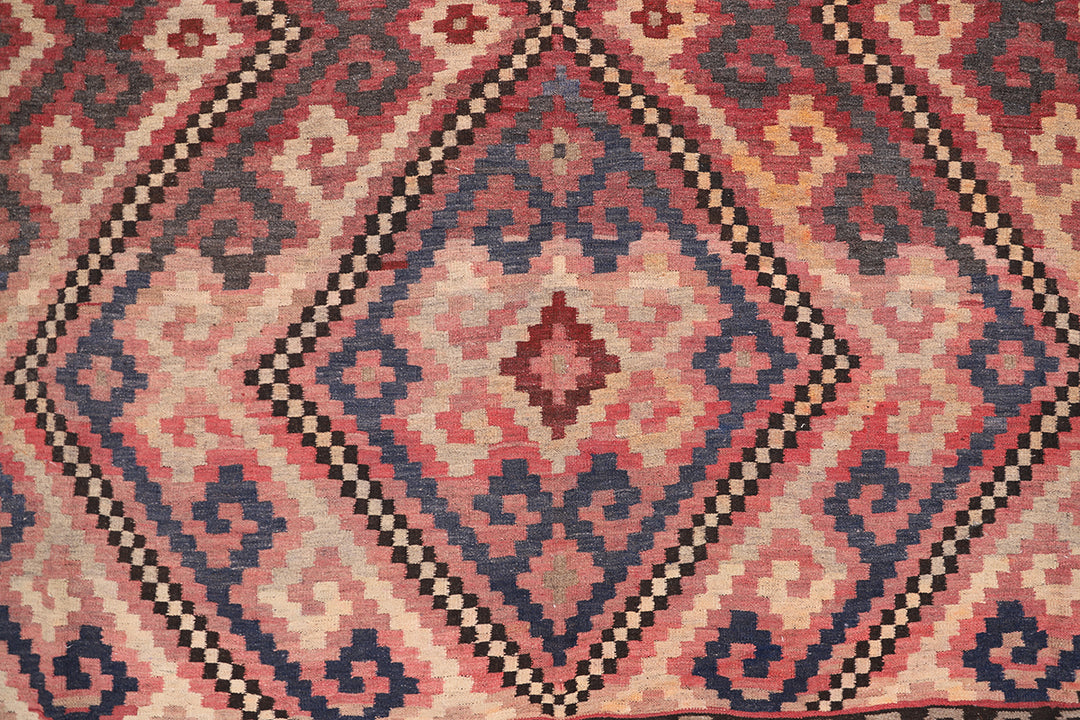 Close-up of a patterned rug with geometric design