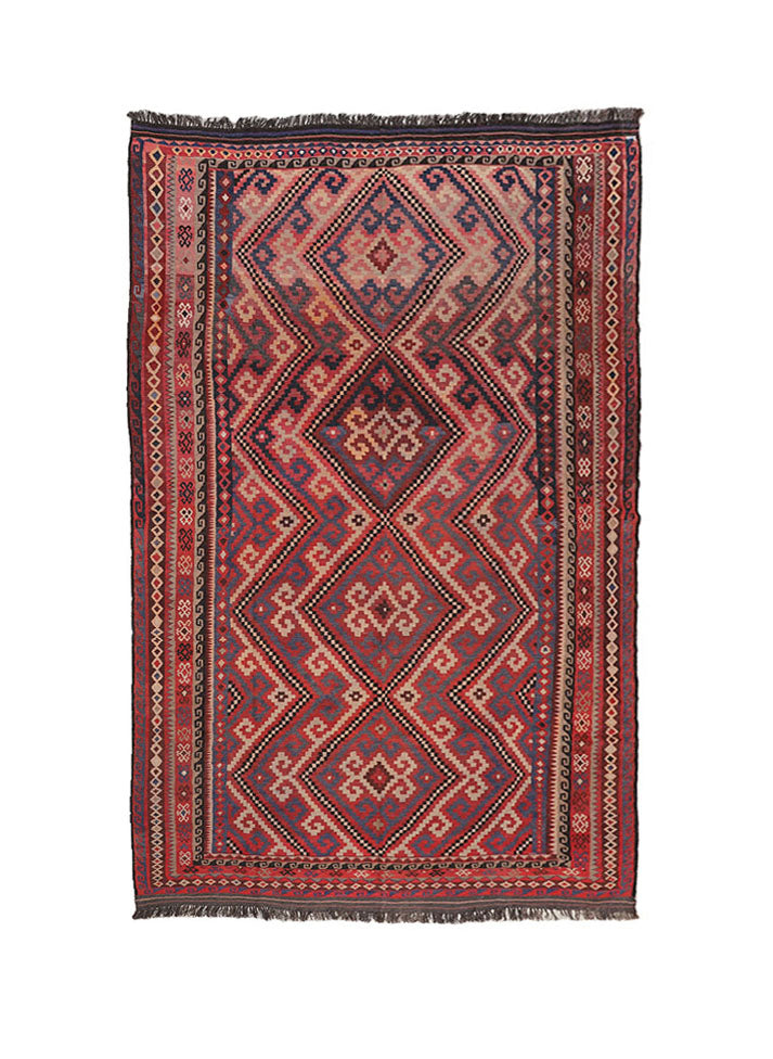 Decorative rug with geometric pattern on a white background