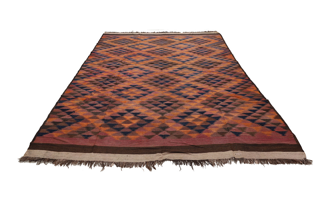 Woven rug with geometric pattern on a white background