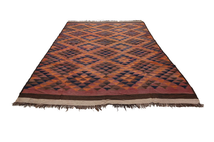Woven rug with geometric pattern on a white background