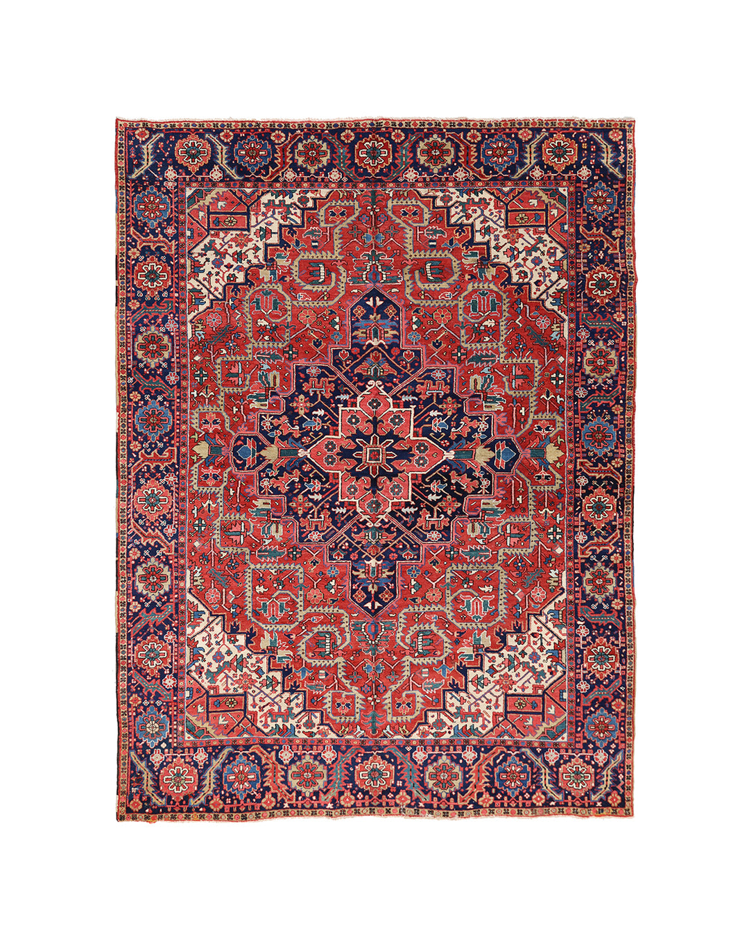 A traditional Persian-style area rug with an intricate geometric and floral pattern, featuring a dominant red field, a navy blue central medallion, and cream and beige accents, shown flat against a white background.