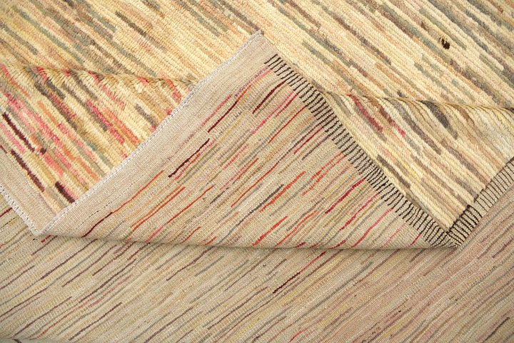 9 foot 7 inch by 13 foot 11 inch hand-knotted organic wool Ariana Barchi Moroccan Atlas style area rug featuring a colorful stria design