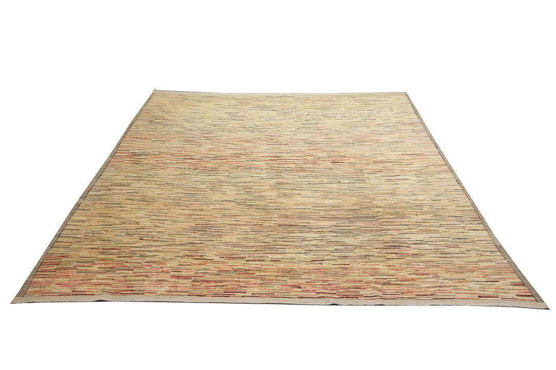 9 foot 7 inch by 13 foot 11 inch hand-knotted organic wool Ariana Barchi Moroccan Atlas style area rug featuring a colorful stria design