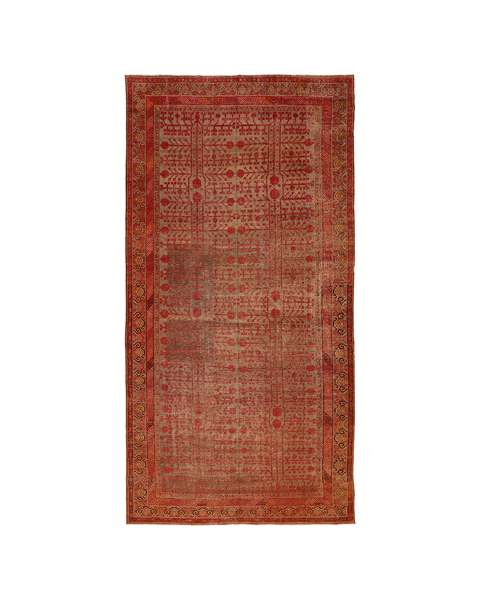 Red patterned rug on a white background