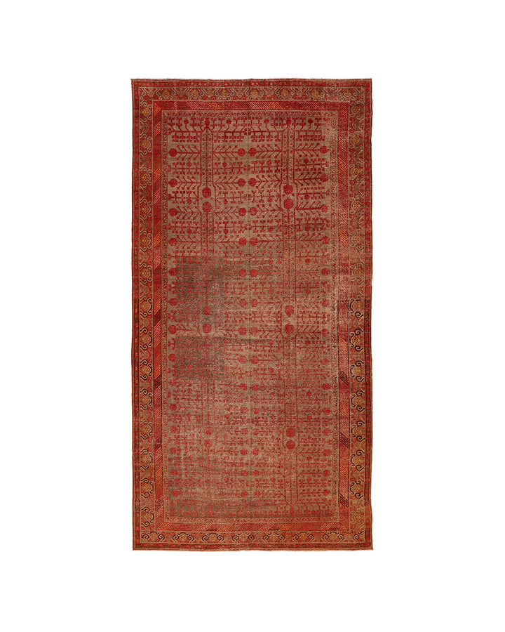 Red patterned rug on a white background