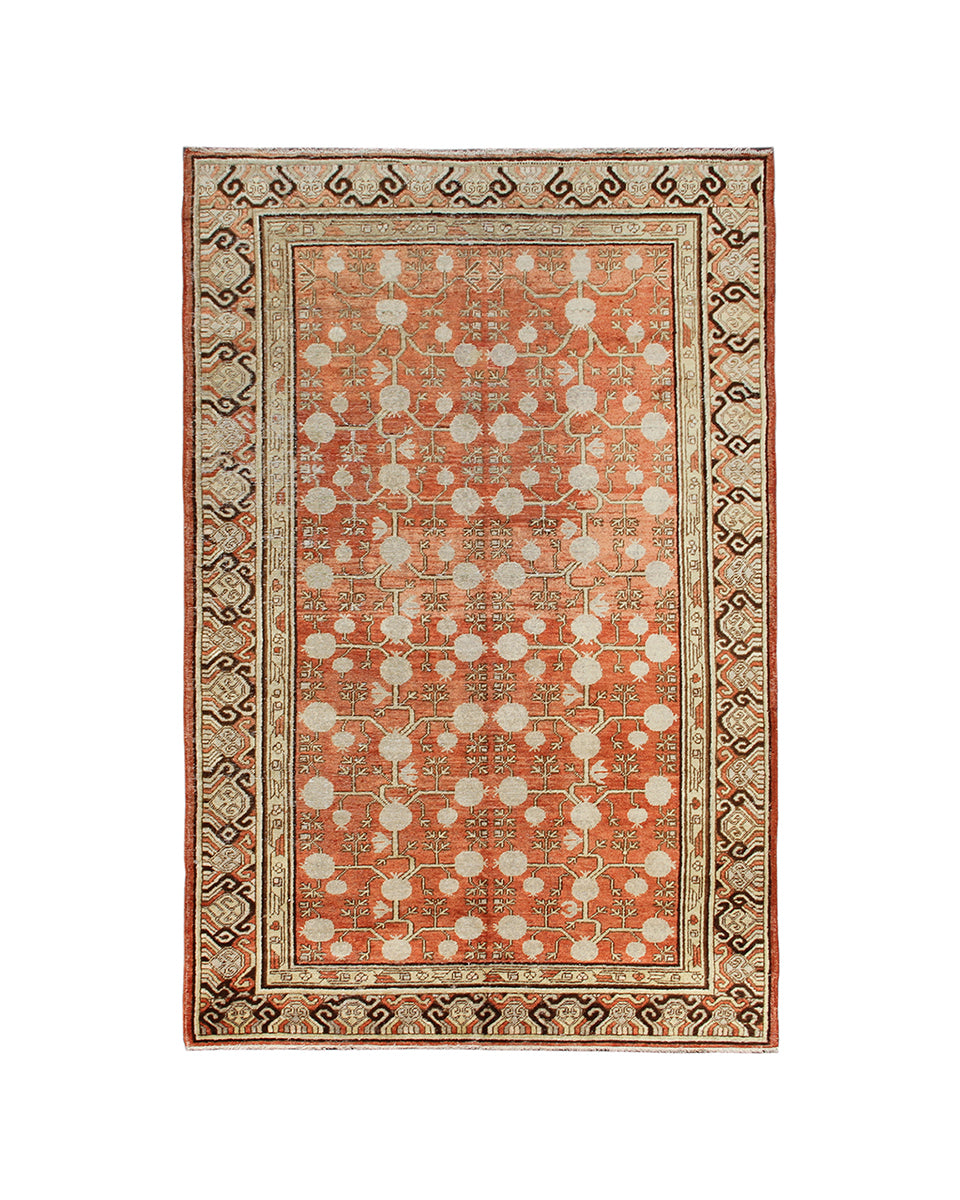 Decorative rug with intricate patterns on a white background