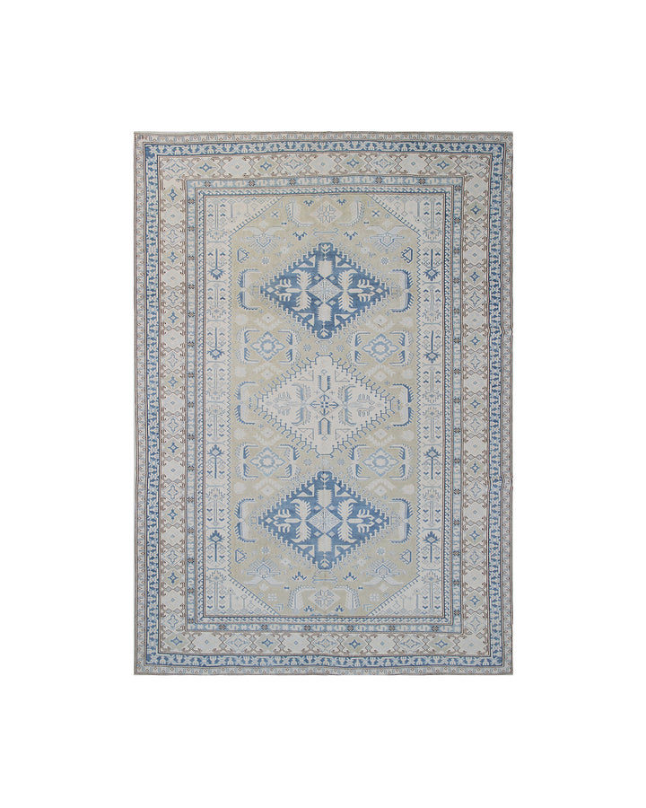 Decorative rug with geometric pattern on a white background