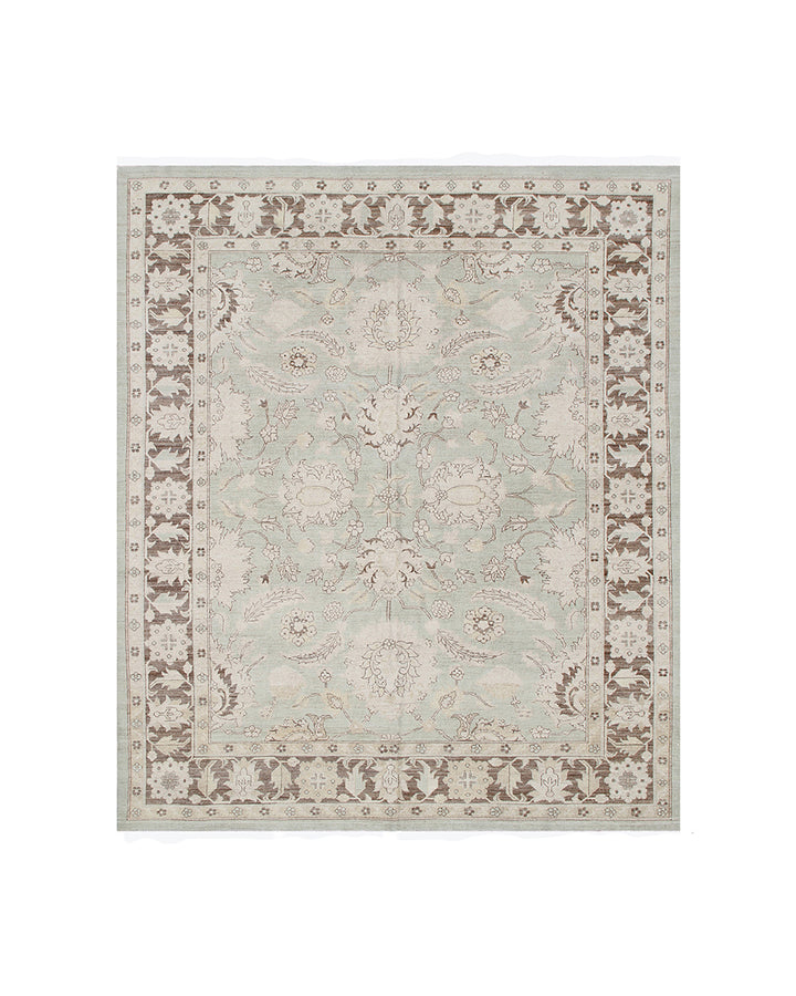 Decorative rug with intricate patterns on a white background