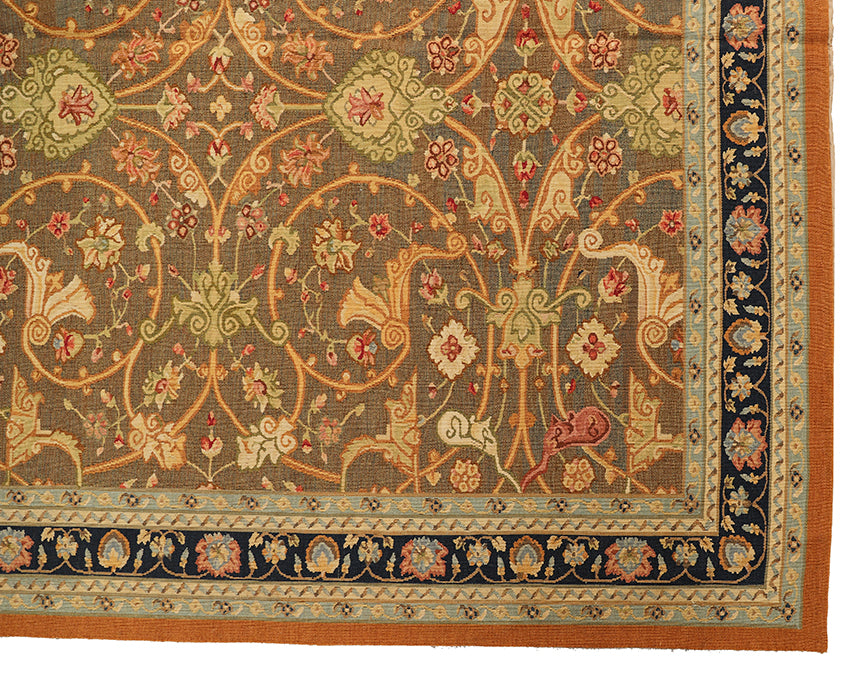 Close-up of an ornate rug with intricate patterns and colors.