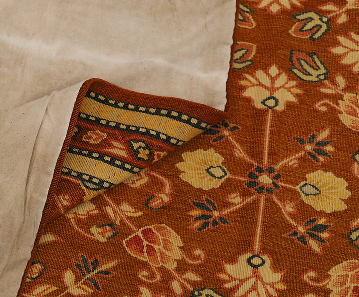 Handwoven brown wool Bessarabian kilim with floral motifs, crafted in the early 2000s by Ariana Rugs. Lightweight, thin flatweave ideal for modern and vintage interiors.