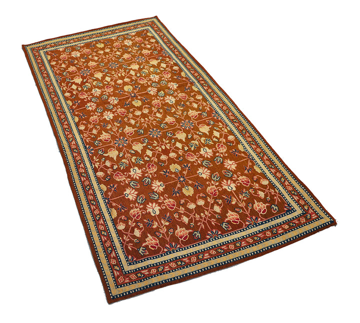 Handwoven brown wool Bessarabian kilim with floral motifs, crafted in the early 2000s by Ariana Rugs. Lightweight, thin flatweave ideal for modern and vintage interiors.