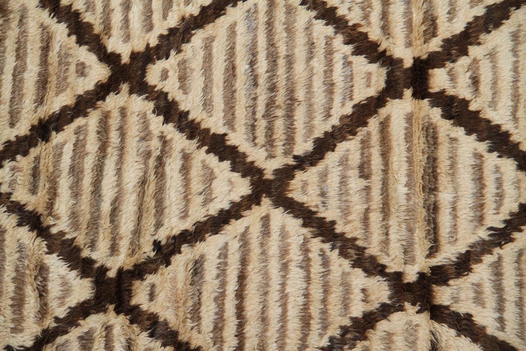 Luxury 12x9 hand-knotted Moroccan style camel brown shaggy rug made of organic wool on cotton foundation from the Ariana Barchi Collection.