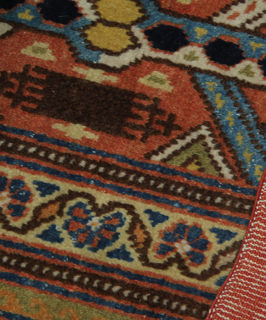 A large 9'4" x 12'2" vintage Khorasan wool rug featuring a navy blue field with intricate geometric patterns and a traditional Persian border.