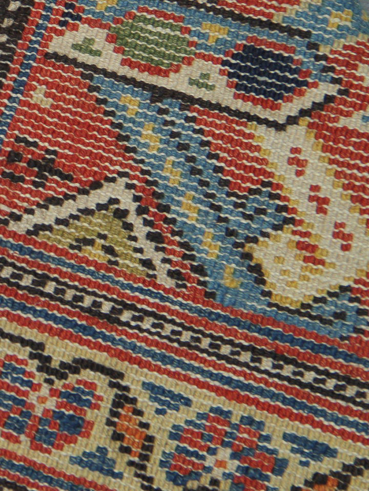 A large 9'4" x 12'2" vintage Khorasan wool rug featuring a navy blue field with intricate geometric patterns and a traditional Persian border.