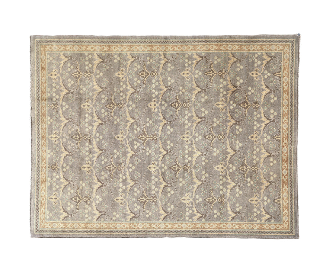 Hand-knotted 7' x 9'9" Afghan Oushak rug with an Ottoman design in soft grey, cream, and brown.