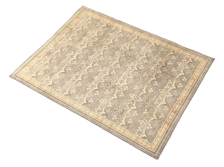 Hand-knotted 7' x 9'9" Afghan Oushak rug with an Ottoman design in soft grey, cream, and brown.