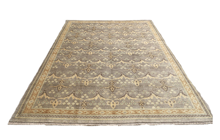 Hand-knotted 7' x 9'9" Afghan Oushak rug with an Ottoman design in soft grey, cream, and brown.