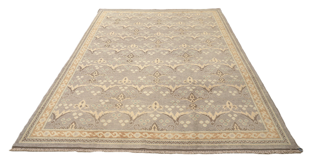 Hand-knotted 7' x 9'9" Afghan Oushak rug with an Ottoman design in soft grey, cream, and brown.