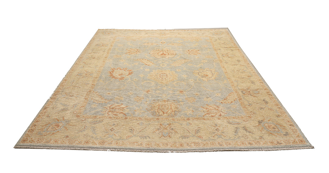 Hand-knotted 8'1" x 9'7" Afghan Oushak rug featuring a soft sky blue field with a sand goldish yellow border and terracotta and cream floral motifs.