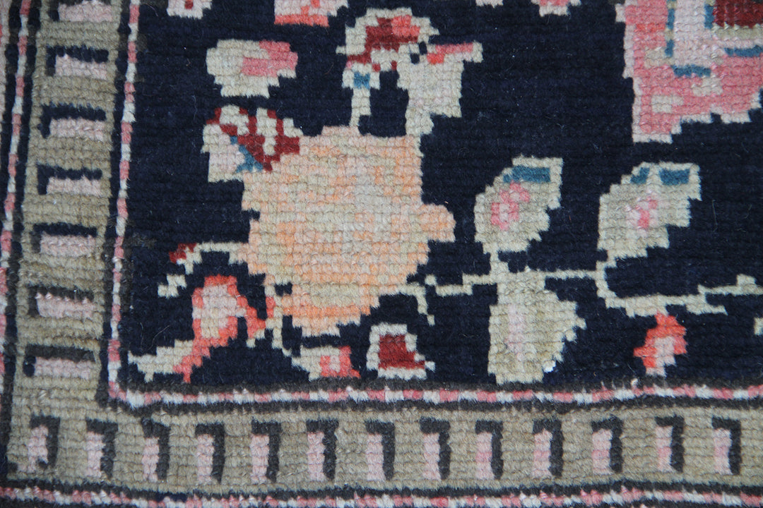 Rare antique Caucasian runner rug featuring 5 distinct geometric medallions on a deep navy blue background with coral, aqua, tan, brown, and green accents