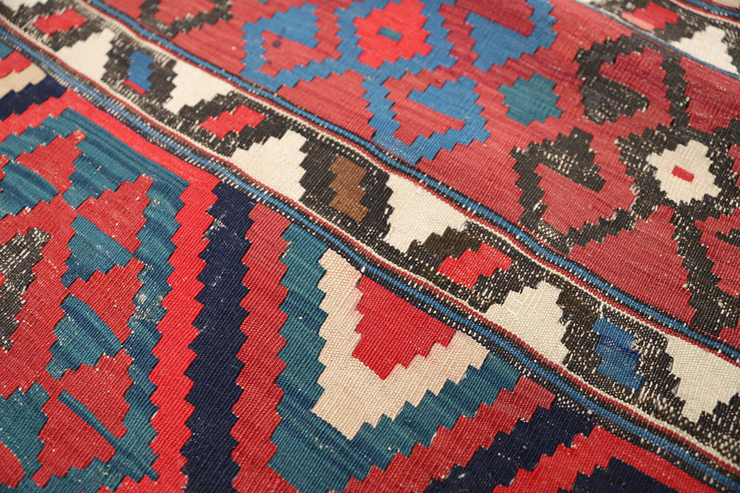 Authentic 8'2" x 9'2" antique Caucasian Shirvan kilim with colorful vegetable dyes, curated by Ariana Rugs in West Hollywood.