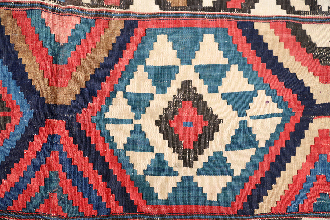 Authentic 8'2" x 9'2" antique Caucasian Shirvan kilim with colorful vegetable dyes, curated by Ariana Rugs in West Hollywood.