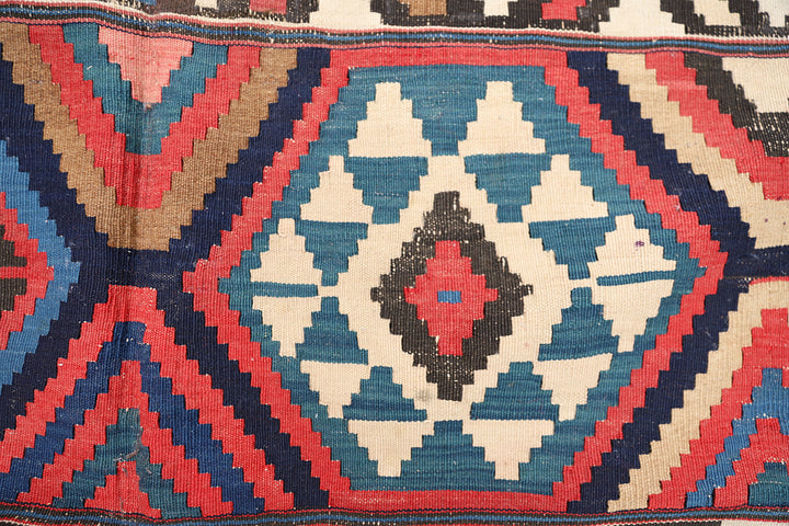 Authentic 8'2" x 9'2" antique Caucasian Shirvan kilim with colorful vegetable dyes, curated by Ariana Rugs in West Hollywood.