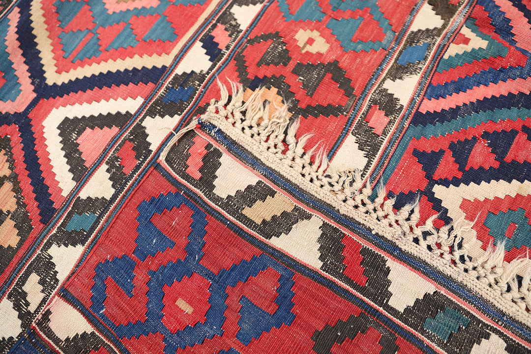 Authentic 8'2" x 9'2" antique Caucasian Shirvan kilim with colorful vegetable dyes, curated by Ariana Rugs in West Hollywood.