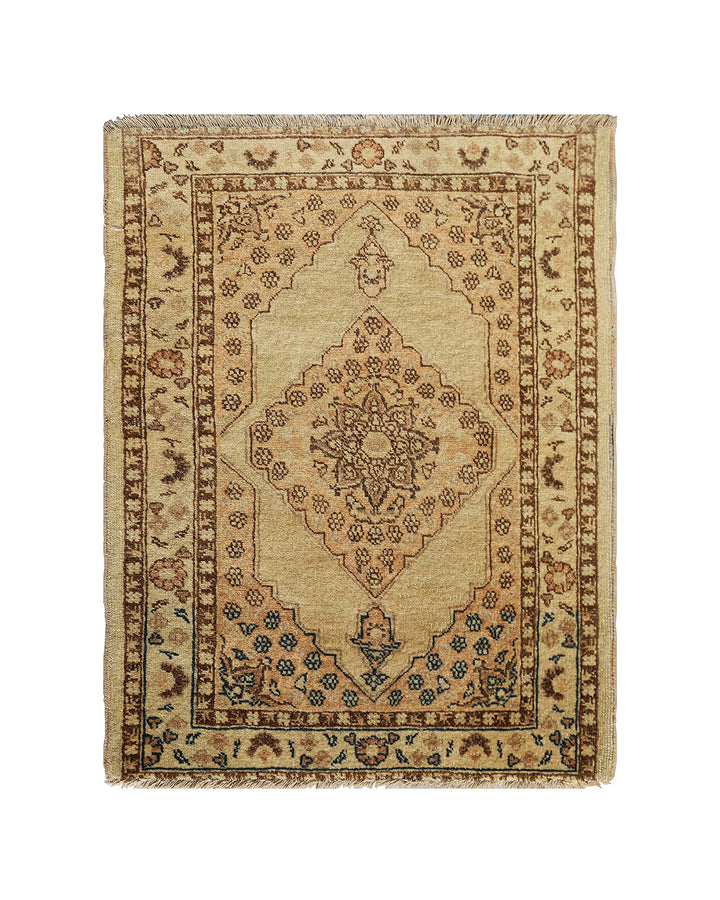 Small antique Haji Jalili design Persian rug featuring tan and gold medallion open field with intricate spandrels and border