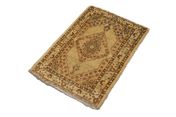 Small antique Haji Jalili design Persian rug featuring tan and gold medallion open field with intricate spandrels and border