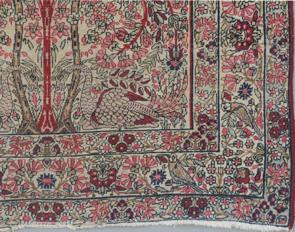 19th-century antique Persian Kermanshah rug depicting a detailed directional Tree of Life pictorial design in fine hand-knotted wool
