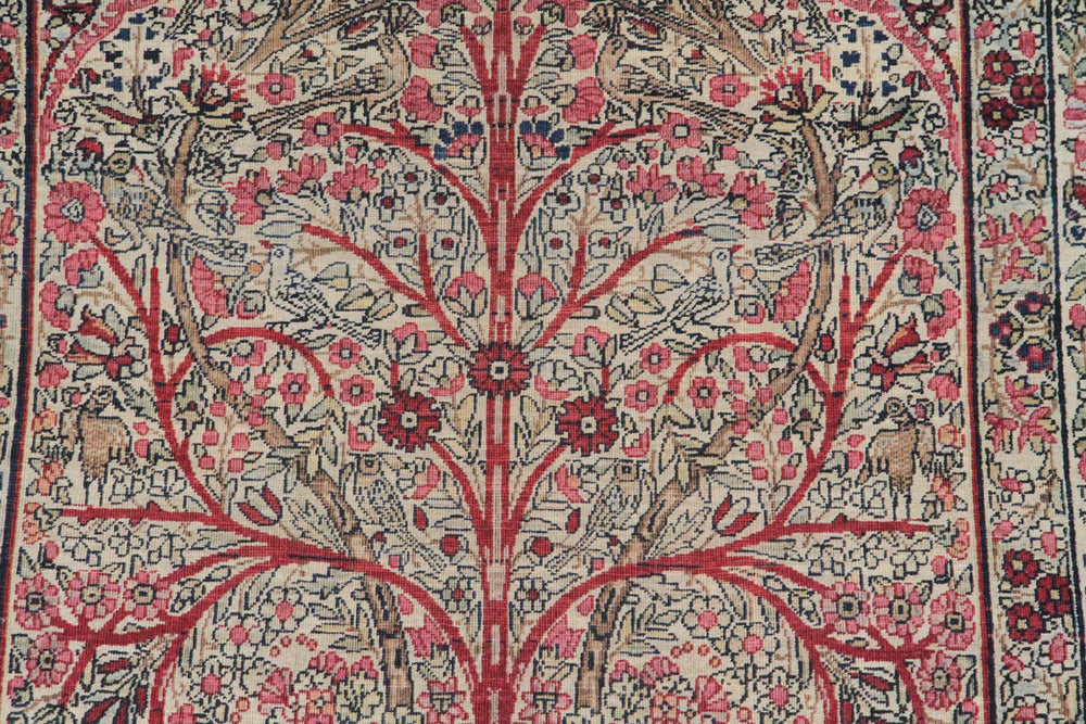 19th-century antique Persian Kermanshah rug depicting a detailed directional Tree of Life pictorial design in fine hand-knotted wool