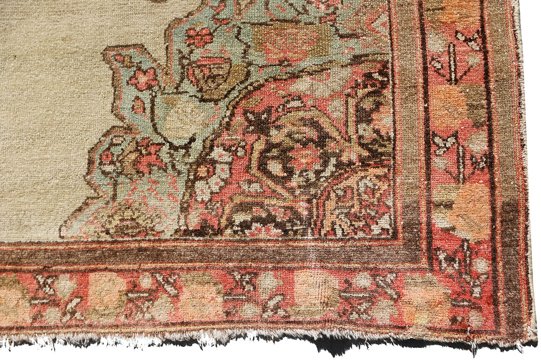 Antique Persian Malayer rug 4x6 featuring a central medallion on an open beige field with brown geometric floral pattern