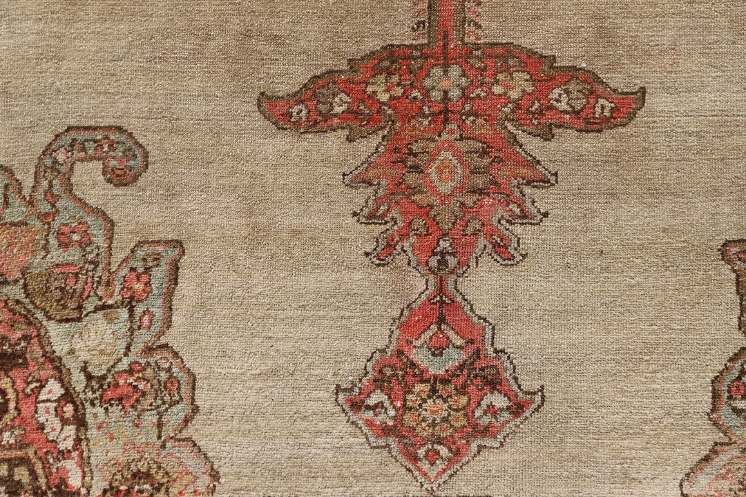 Antique Persian Malayer rug 4x6 featuring a central medallion on an open beige field with brown geometric floral pattern