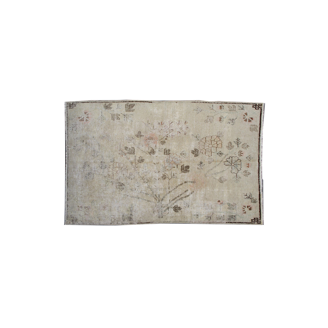 Authentic 2nd quarter 20th century antique hand-knotted Samarkand Khotan wool rug with distressed washed-out pink brown and beige botanical design