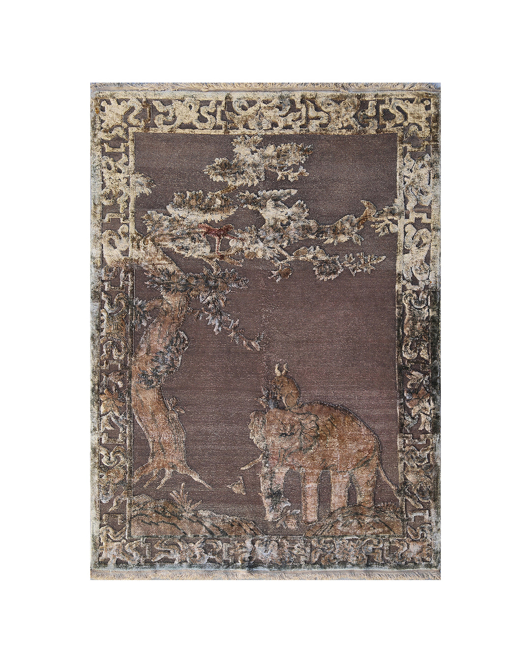 A rectangular area rug with a distressed traditional design, featuring a central brown field with an elephant and tree motif, surrounded by an ornate beige border.