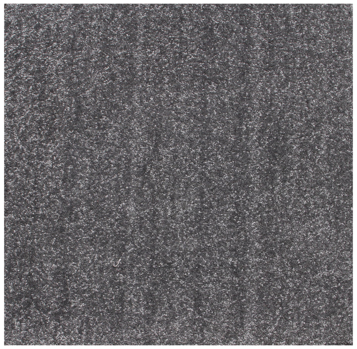 Close-up view of a textured gray Axminster rug.